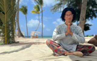 Wellness Sales Director Reyes Guzman about Meliá Punta Cana Beach with prayer hands
